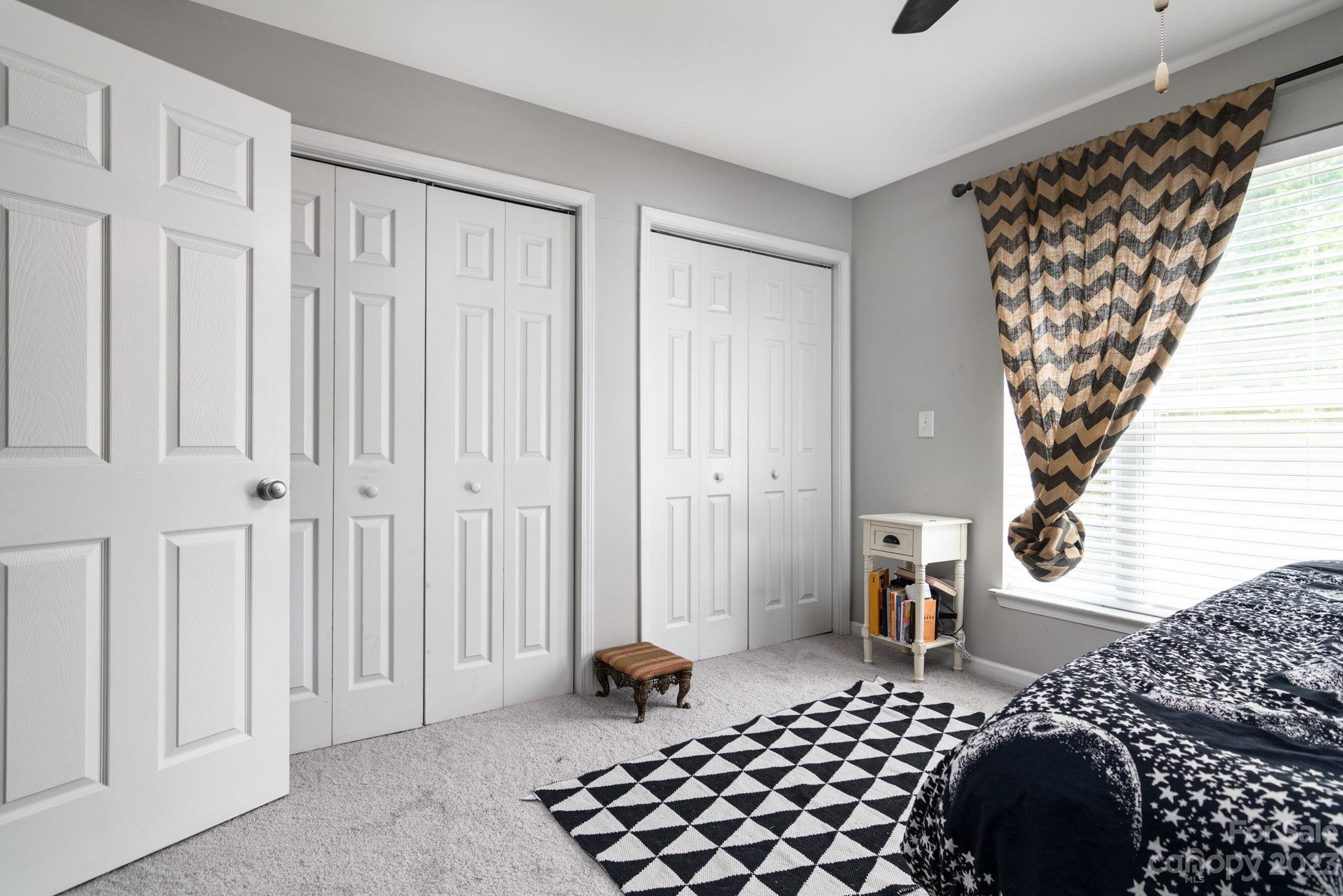 615 Raphael Place Charlotte, NC 28205 - Photo 12 of 20 a bedroom with furniture and a window