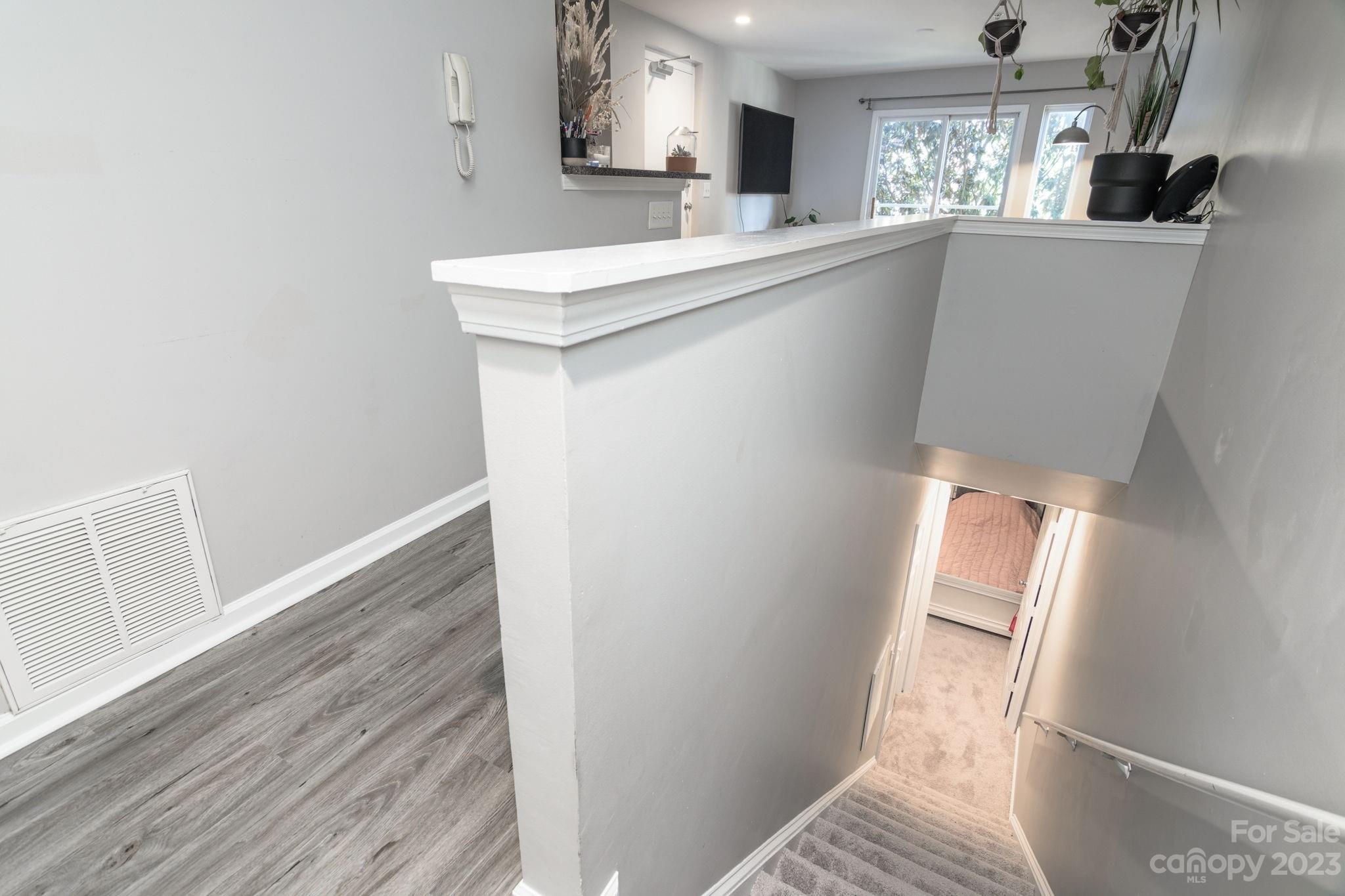 615 Raphael Place Charlotte, NC 28205 - Photo 13 of 20 a kitchen with a sink a refrigerator and window