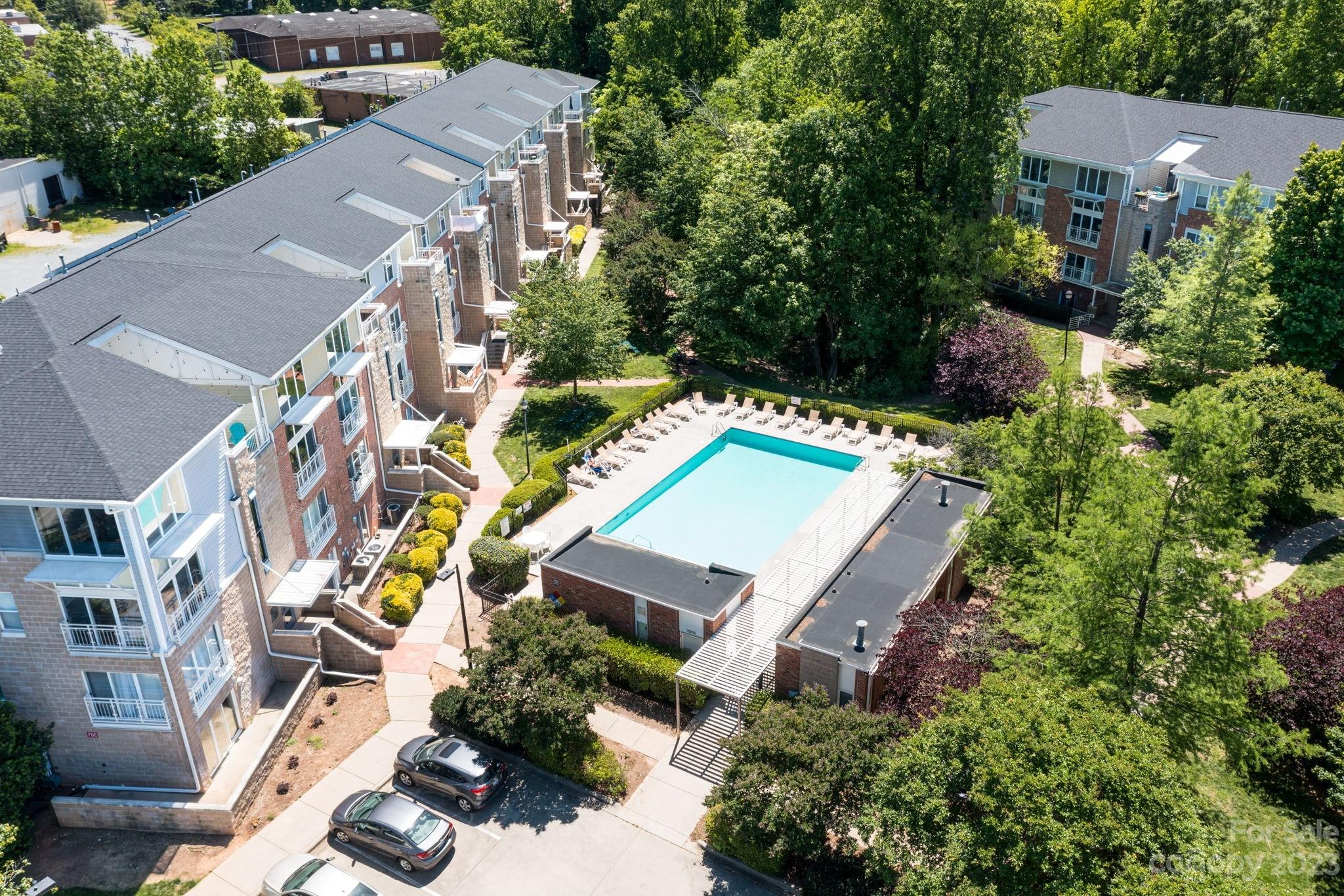 615 Raphael Place Charlotte, NC 28205 - Photo 19 of 20 an aerial view of a house with a yard and trees