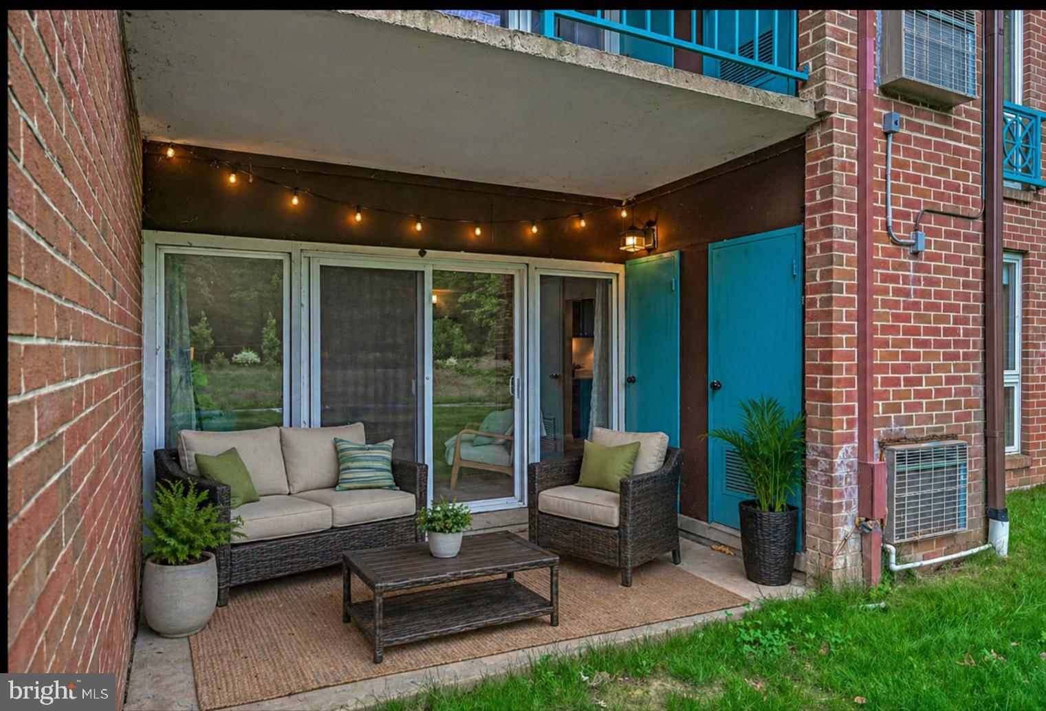 11804 Breton Court, Unit 1A Reston, VA 20191 - Photo 14 of 19 Charming patio retreat with greenery.