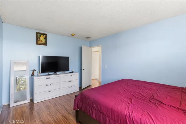 a bathroom with a shower and a toilet