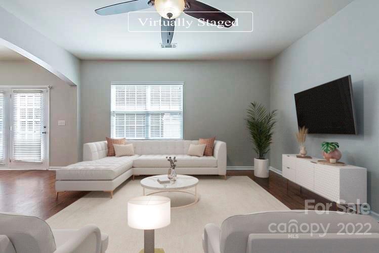705 Jones Branch Road Fort Mill, SC 29715 - Photo 2 of 18 a living room with furniture and a flat screen tv