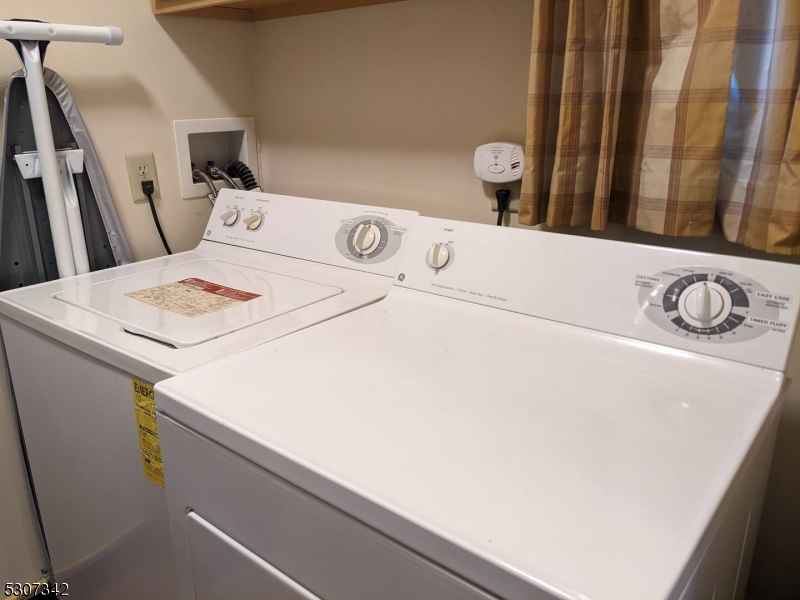 3 Maple Crescent, Unit 13 Vernon, NJ 07462 - Photo 18 of 20 a utility room with dryer and washer
