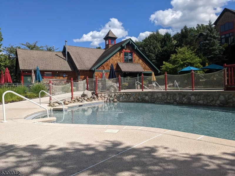 3 Maple Crescent, Unit 13 Vernon, NJ 07462 - Photo 10 of 20 a view of a house with a yard