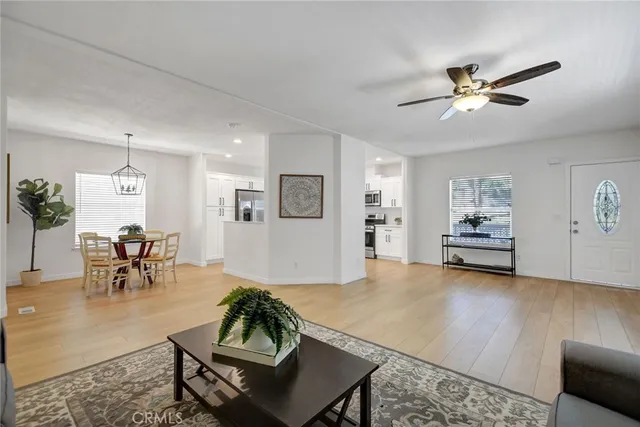 a living room with furniture and window