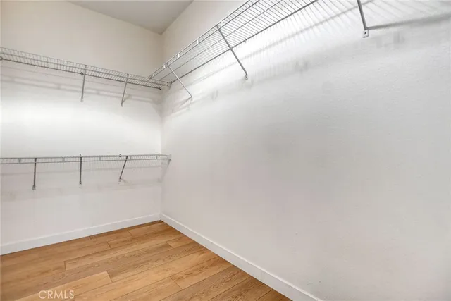 a view of a room with racks on the wall