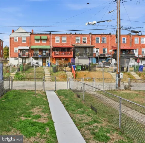 a view of a swimming pool with a porch