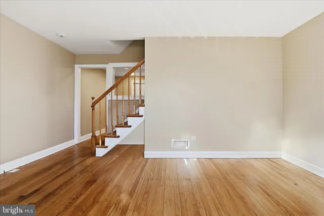 a view of entryway with wooden floor