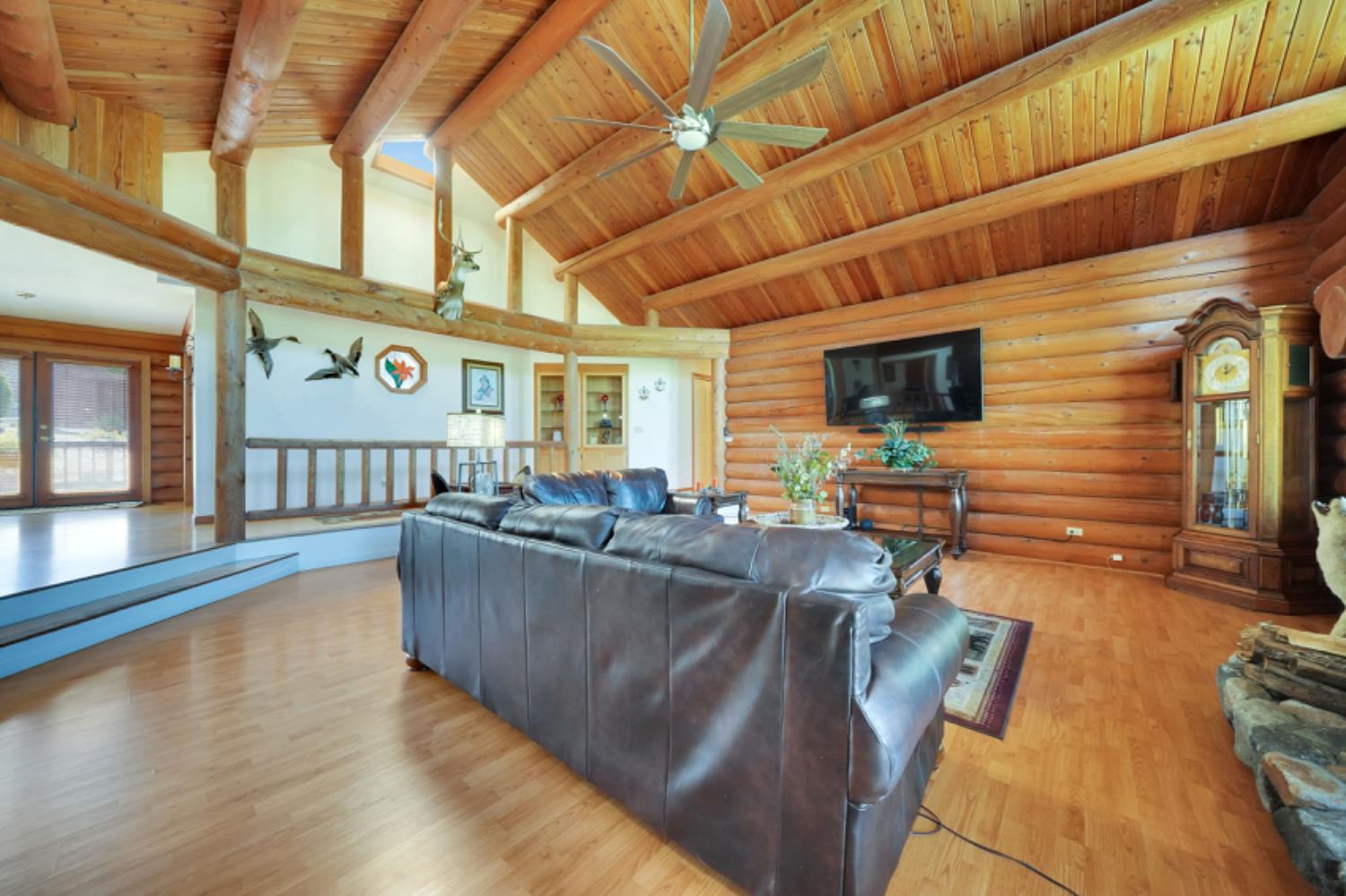 391 Spyglass Road Valley Springs, CA 95252 - Photo 11 of 30 a living room with furniture and a flat screen tv