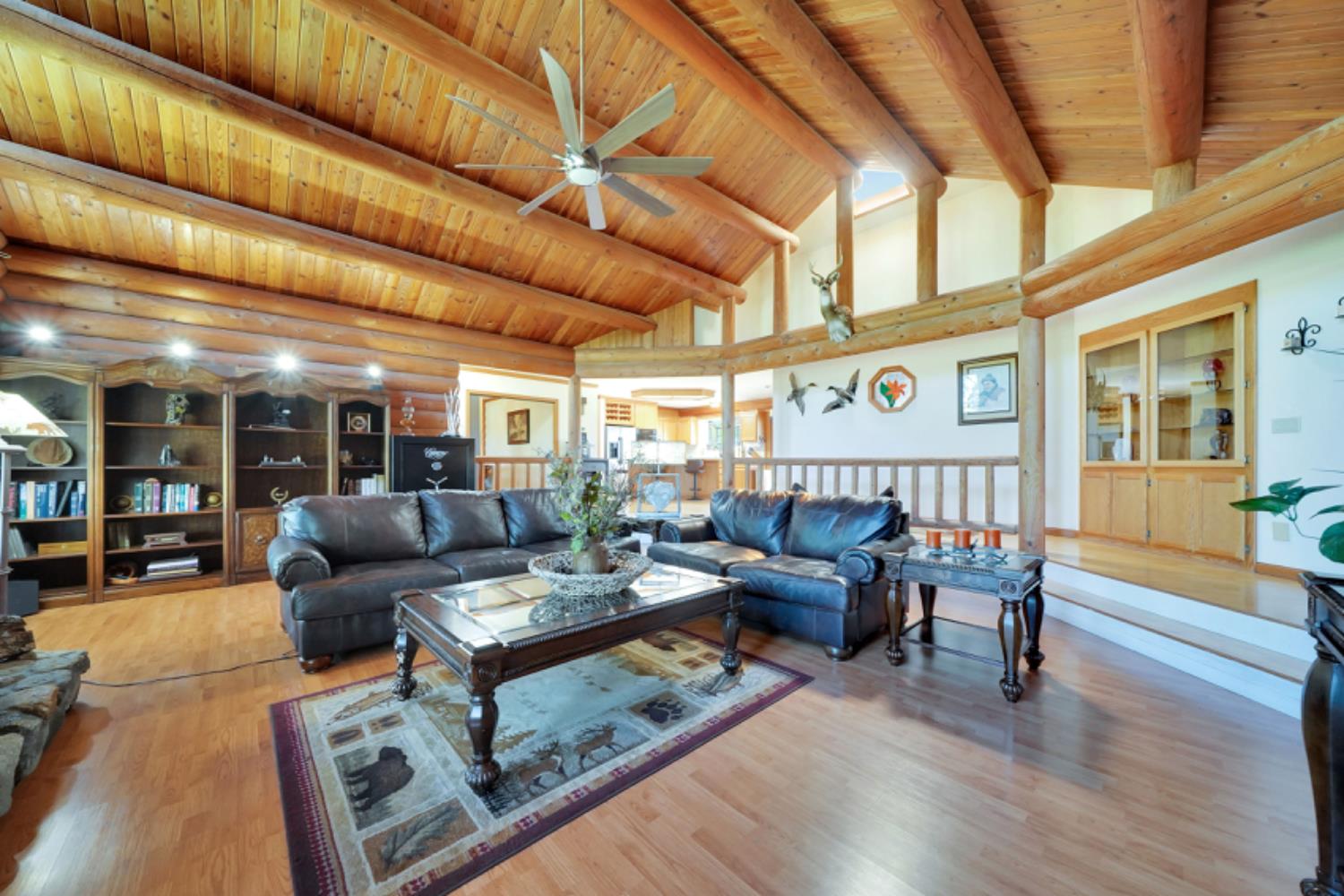 391 Spyglass Road Valley Springs, CA 95252 - Photo 12 of 30 a living room with furniture and wooden floor