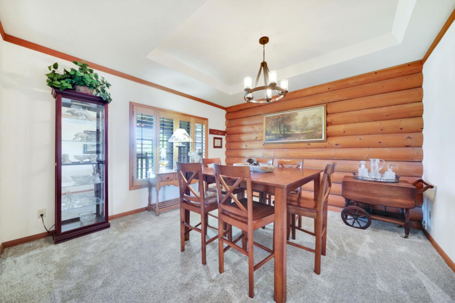 391 Spyglass Road Valley Springs, CA 95252 - Photo 16 of 30 a view of a dining room with furniture window and outside view