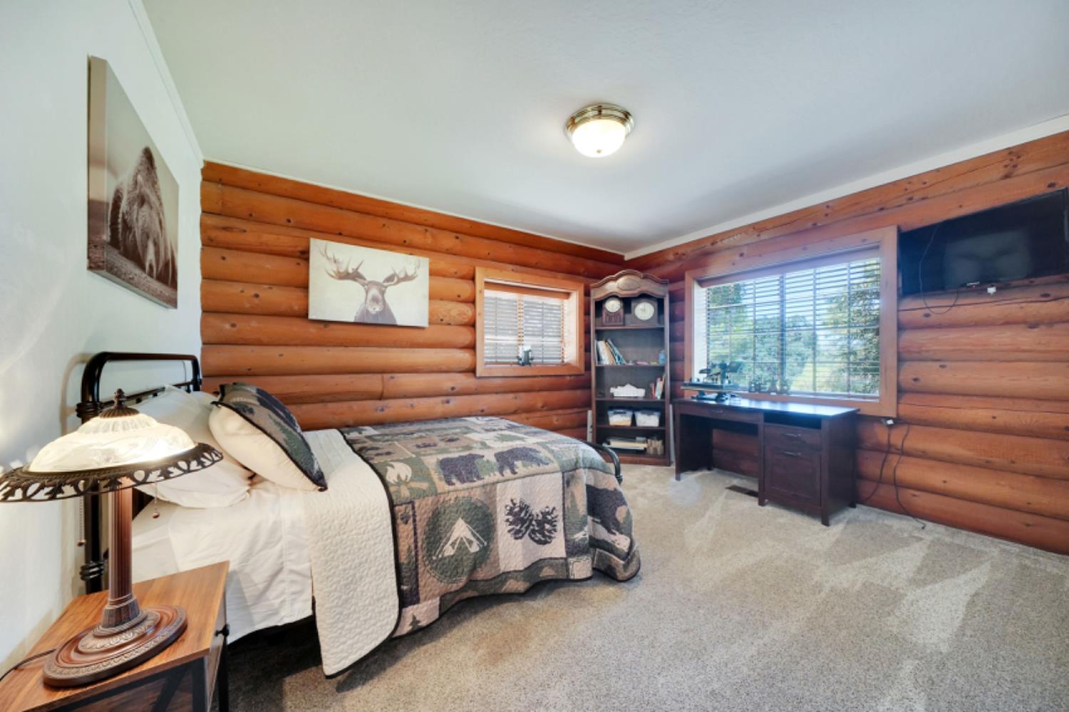 391 Spyglass Road Valley Springs, CA 95252 - Photo 23 of 30 a bedroom with a bed and a window