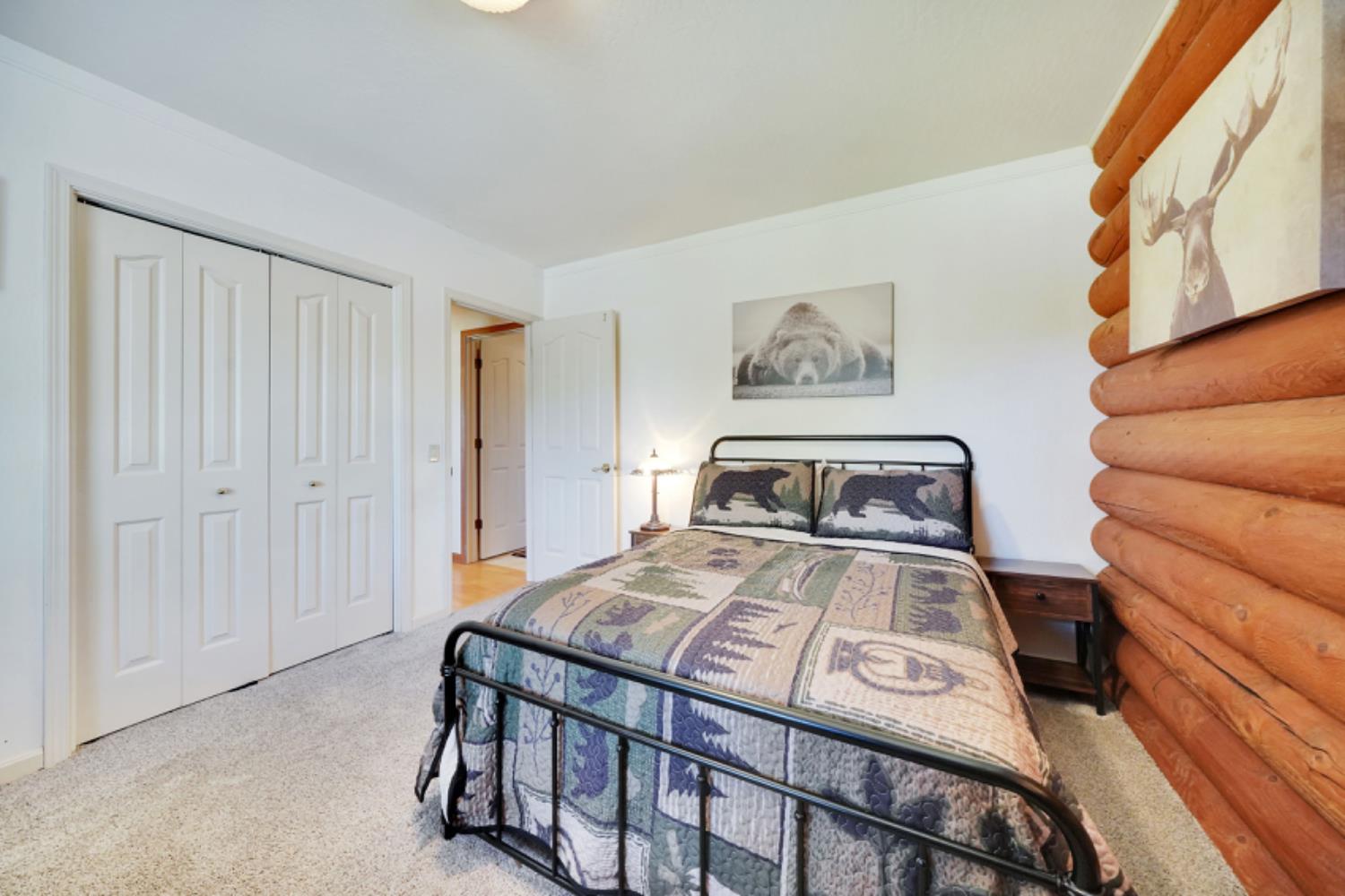 391 Spyglass Road Valley Springs, CA 95252 - Photo 24 of 30 a bedroom with a bed and a painting on the wall