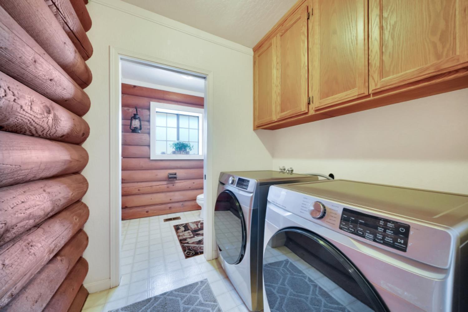 391 Spyglass Road Valley Springs, CA 95252 - Photo 28 of 30 a utility room with dryer and washer