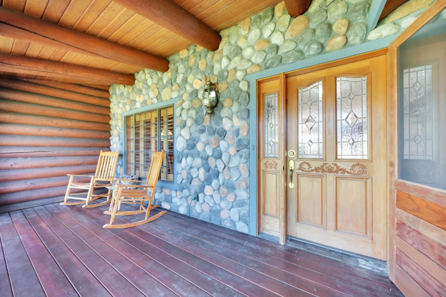 391 Spyglass Road Valley Springs, CA 95252 - Photo 30 of 30 a view of a room with wooden floor lounge chair and windows