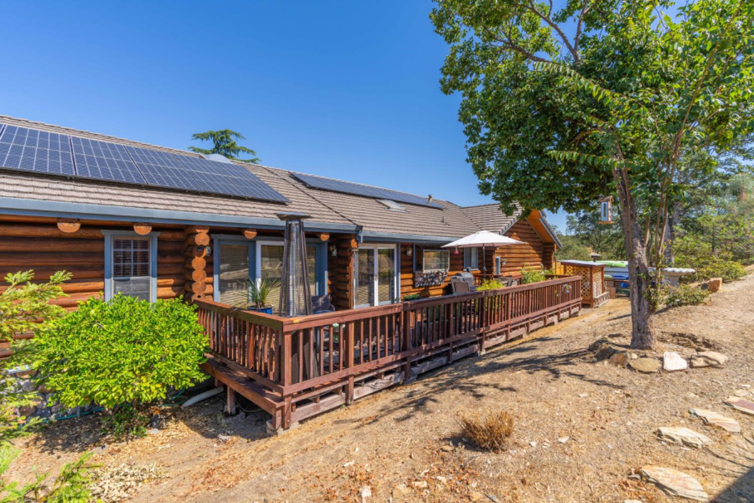 391 Spyglass Road Valley Springs, CA 95252 - Photo 6 of 30 a view of a house with a wooden deck