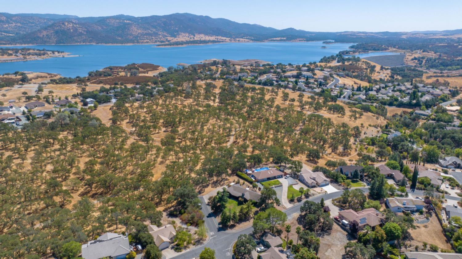 391 Spyglass Road Valley Springs, CA 95252 - Photo 7 of 30 a view of lake and mountain