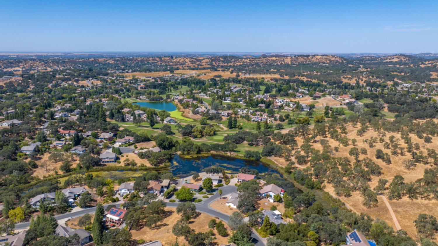 391 Spyglass Road Valley Springs, CA 95252 - Photo 8 of 30 an aerial view of residential house with yard and mountain view in back