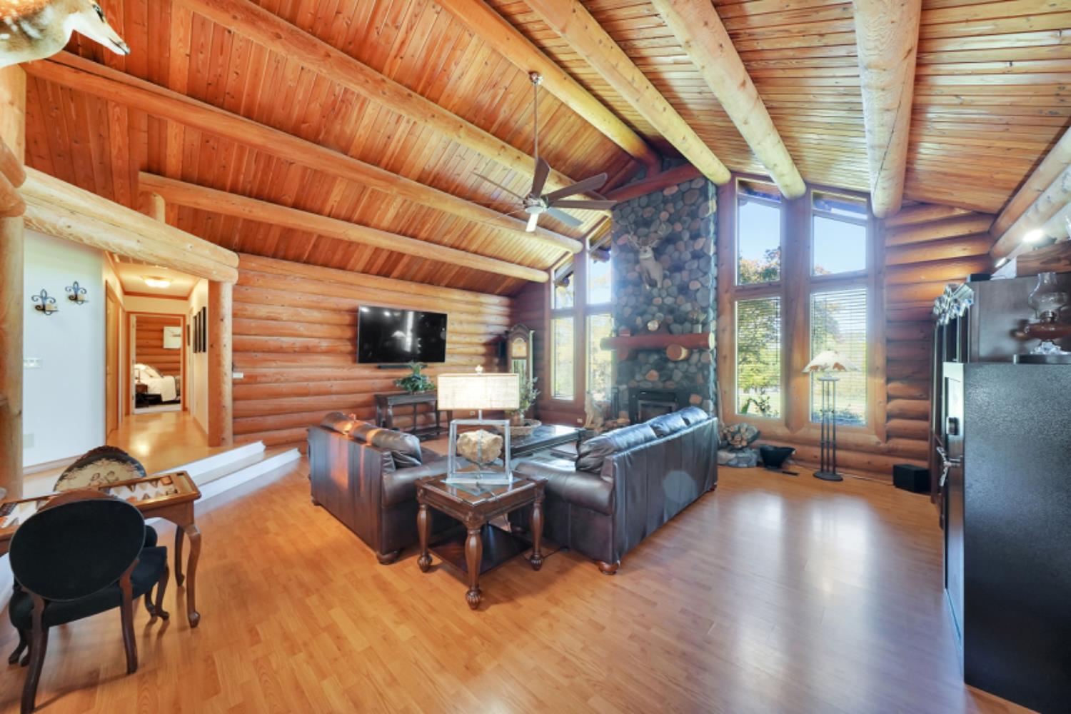 391 Spyglass Road Valley Springs, CA 95252 - Photo 10 of 30 a living room with furniture and a flat screen tv