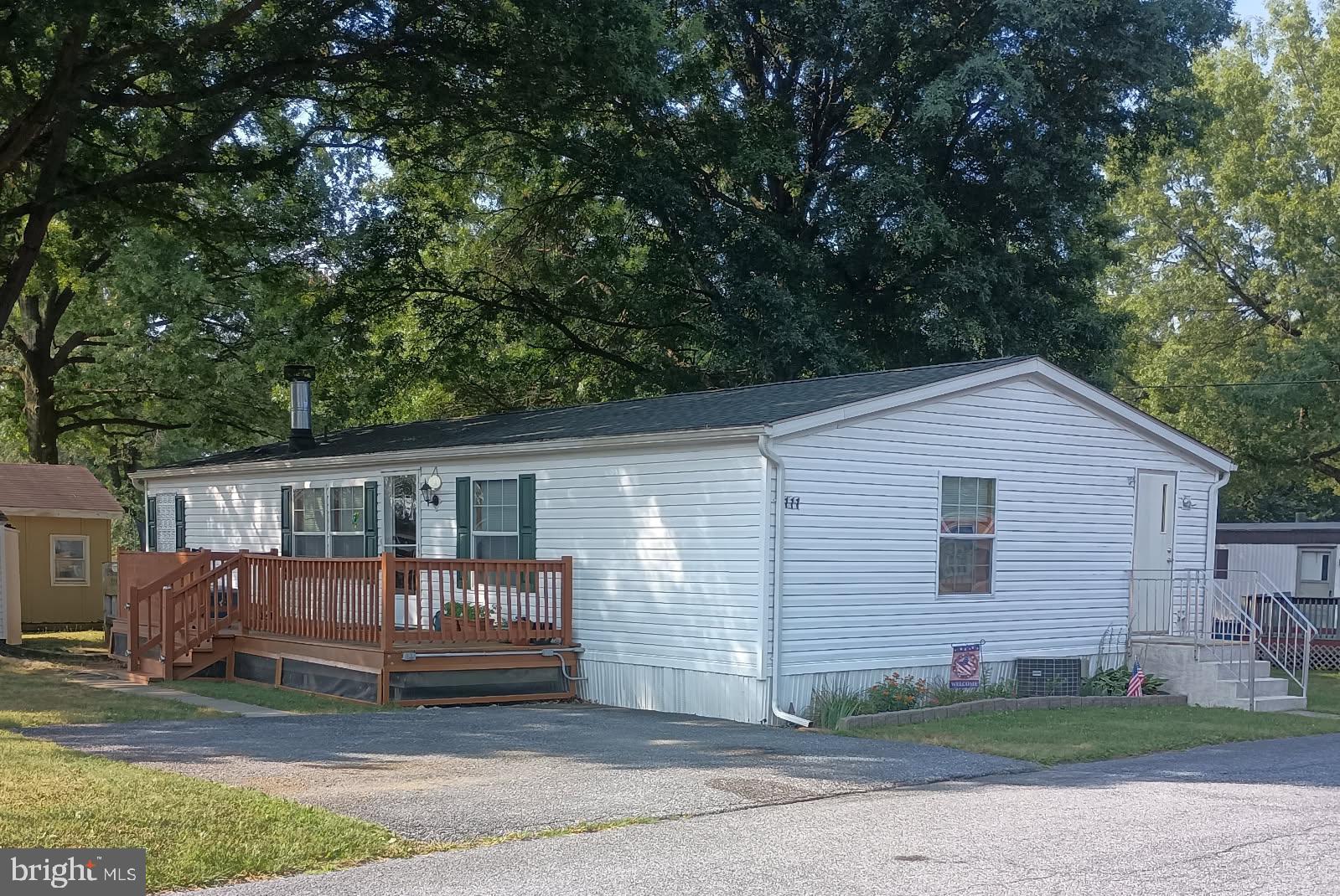 111 Nancy Boulevard Middletown, PA 17057 - Photo 1 of 28 a view of a house with a small yard and wooden fence