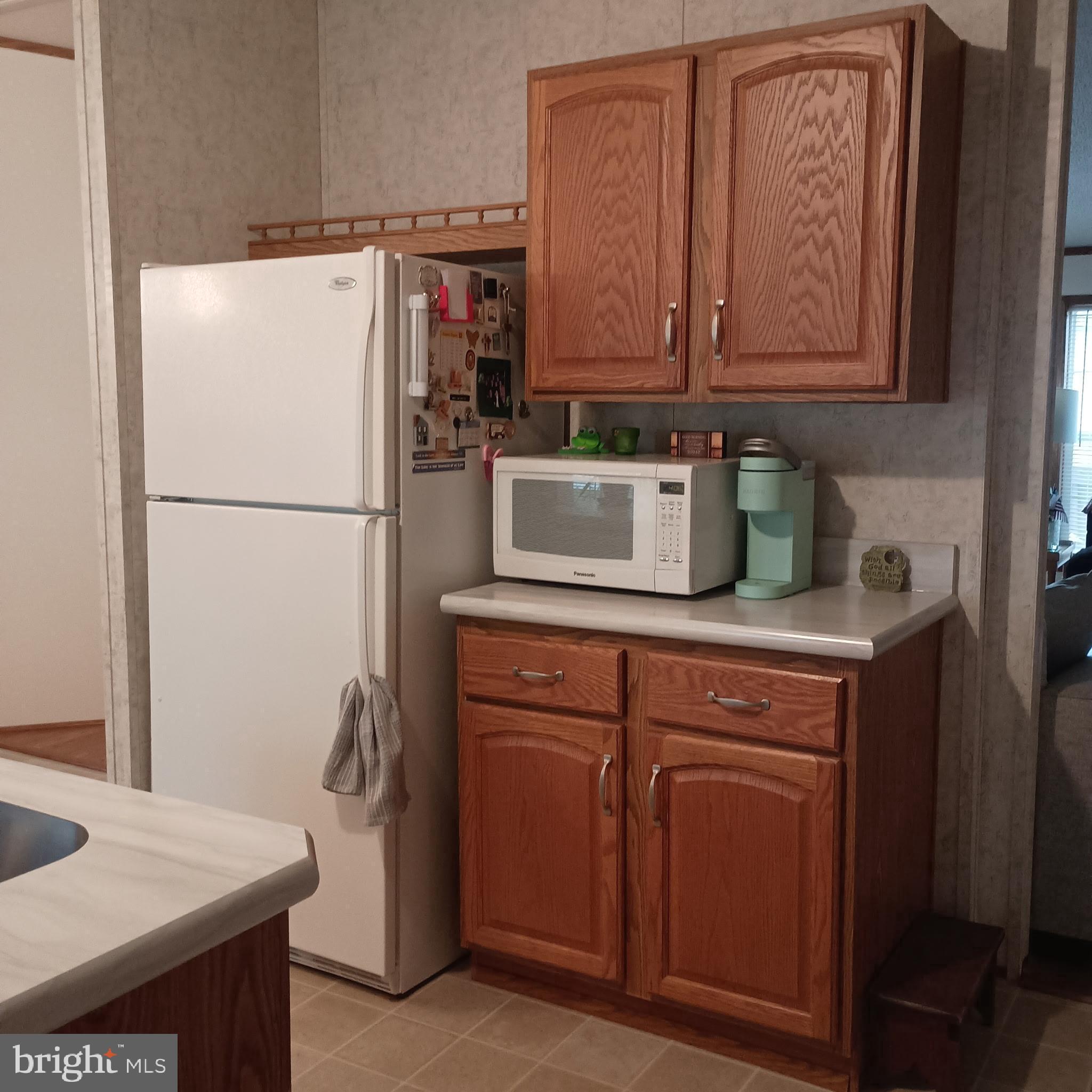 111 Nancy Boulevard Middletown, PA 17057 - Photo 14 of 28 a kitchen with stainless steel appliances granite countertop a refrigerator sink and cabinets