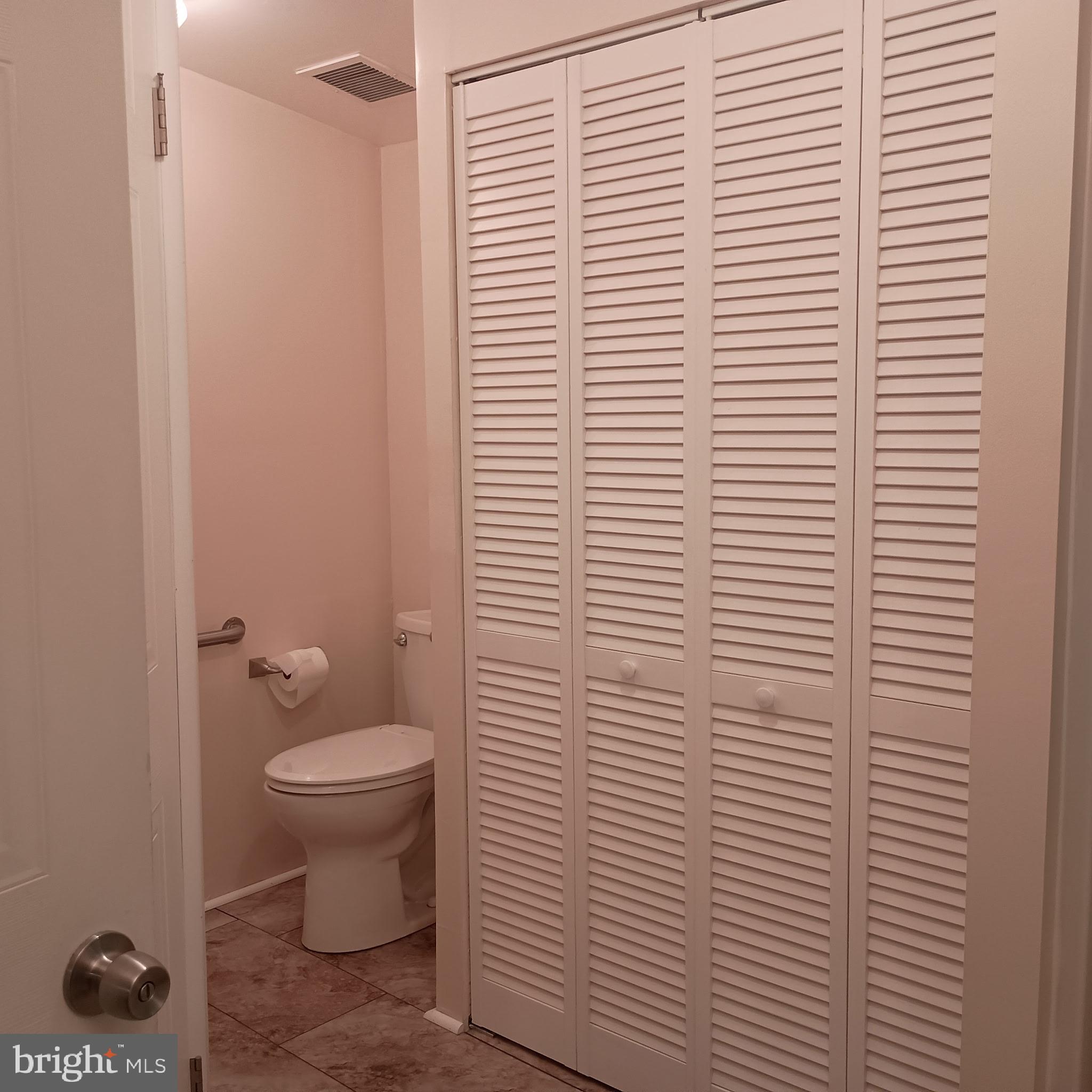 111 Nancy Boulevard Middletown, PA 17057 - Photo 19 of 28 a bathroom with a toilet a sink and a window