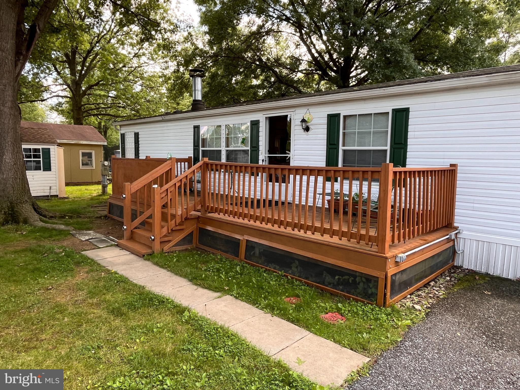 111 Nancy Boulevard Middletown, PA 17057 - Photo 2 of 28 a view of a house with a yard and a wooden deck