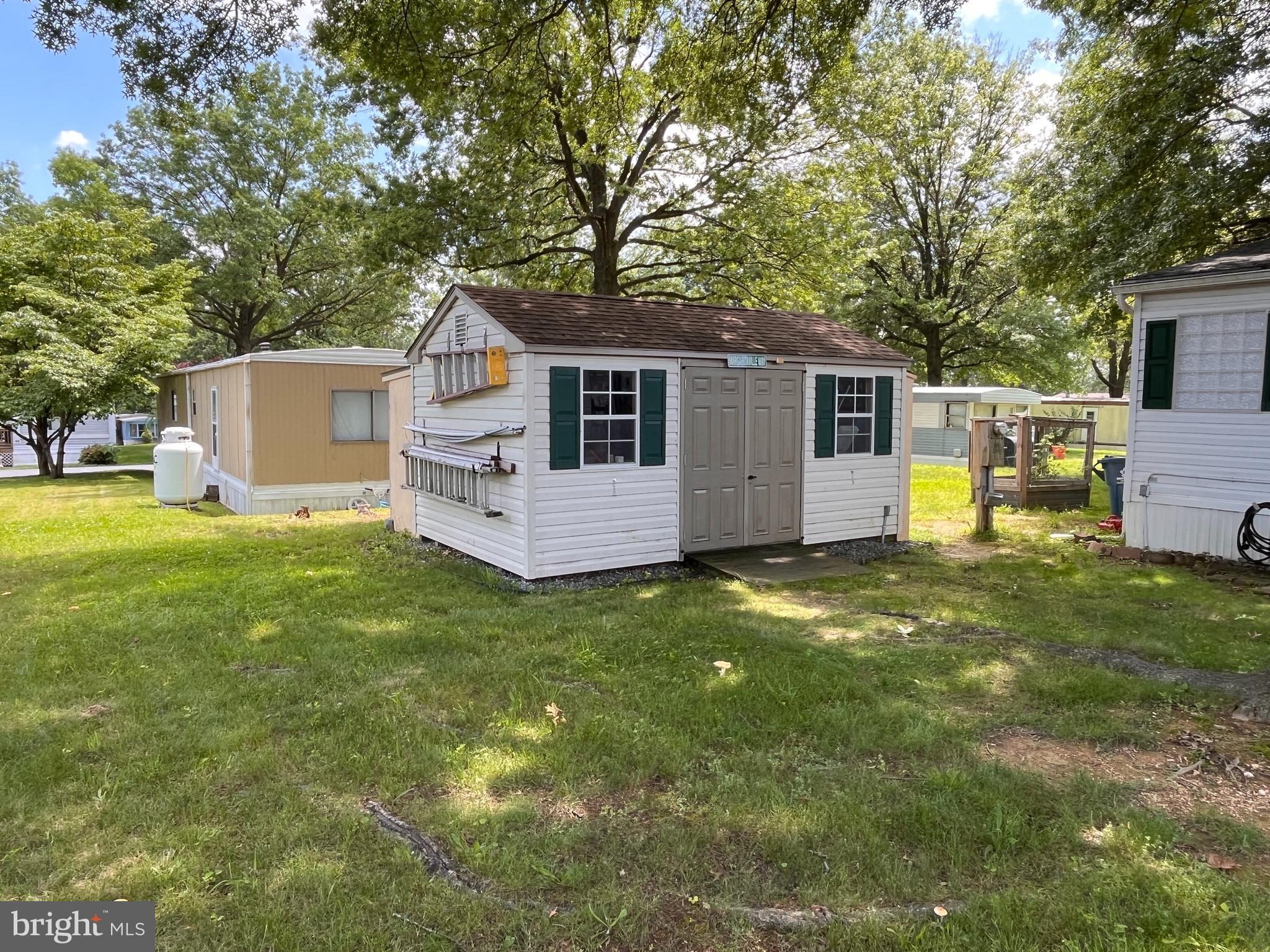 111 Nancy Boulevard Middletown, PA 17057 - Photo 25 of 28 a front view of house with yard and trees