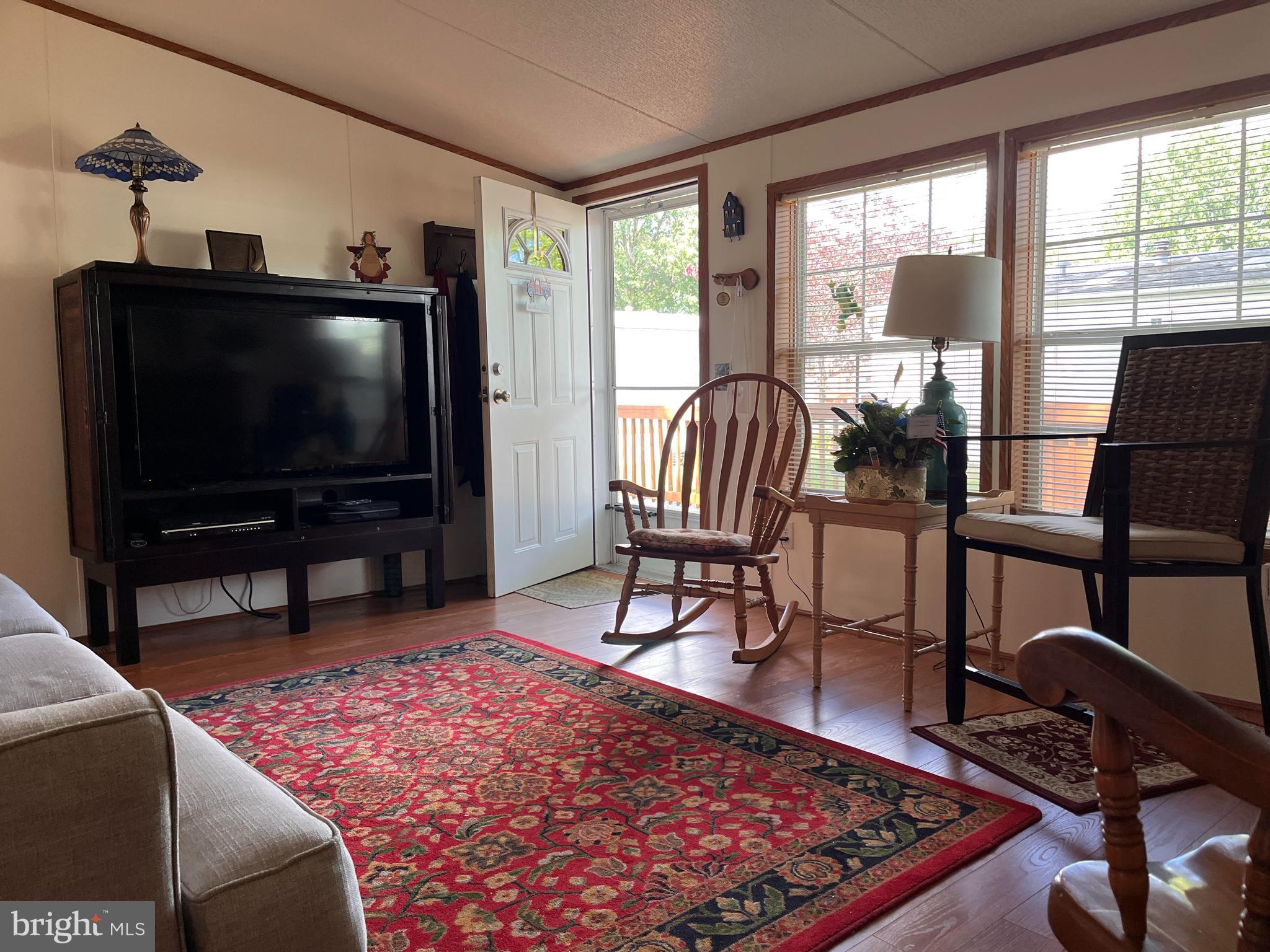 111 Nancy Boulevard Middletown, PA 17057 - Photo 3 of 28 a living room with furniture and a flat screen tv