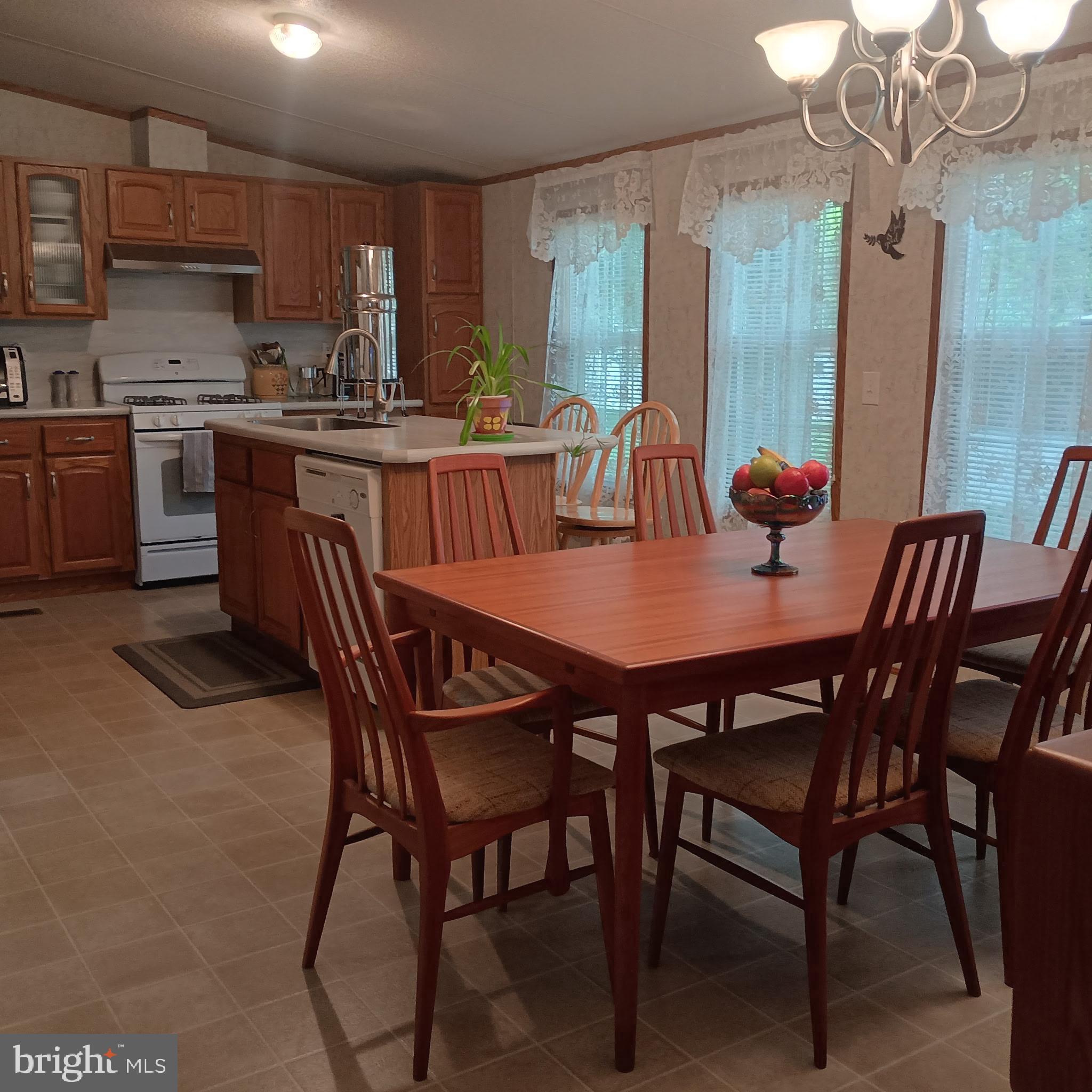 111 Nancy Boulevard Middletown, PA 17057 - Photo 6 of 28 a dining room with a wooden table and chairs