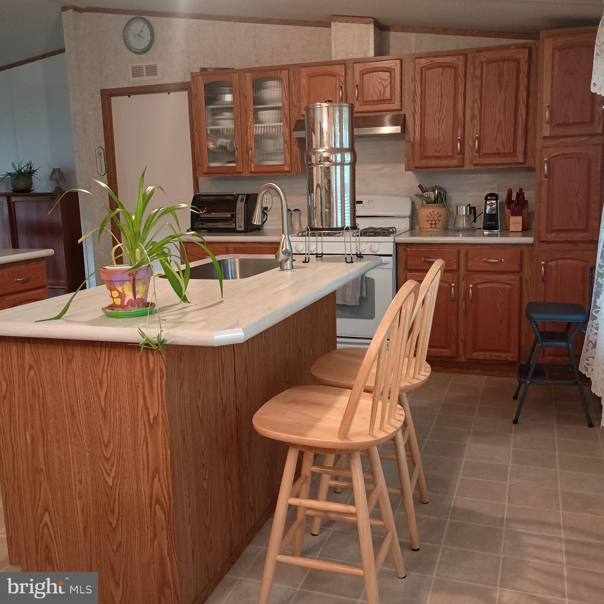111 Nancy Boulevard Middletown, PA 17057 - Photo 9 of 28 a kitchen with stainless steel appliances a sink a table and chair