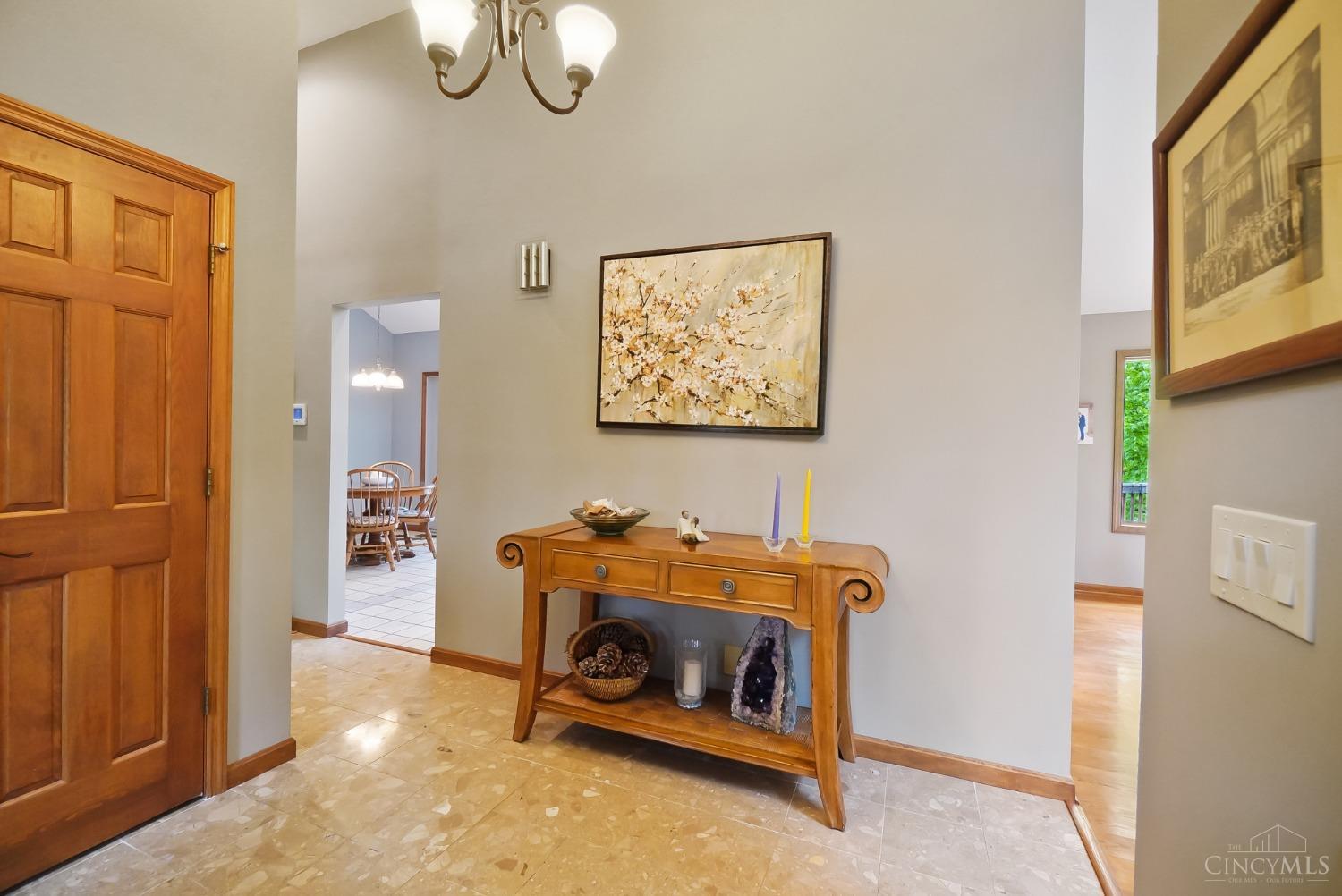 10907 Sand Run Road Harrison, OH 45030 - Photo 14 of 88 The spacious entryway leads to the kitchen on the left and great room on the right.