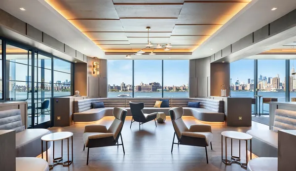 a dining room with furniture a chandelier and wooden floor