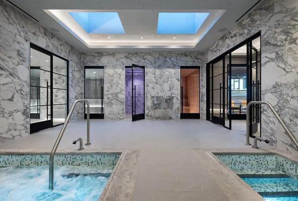 a bathroom with a bathtub and shower