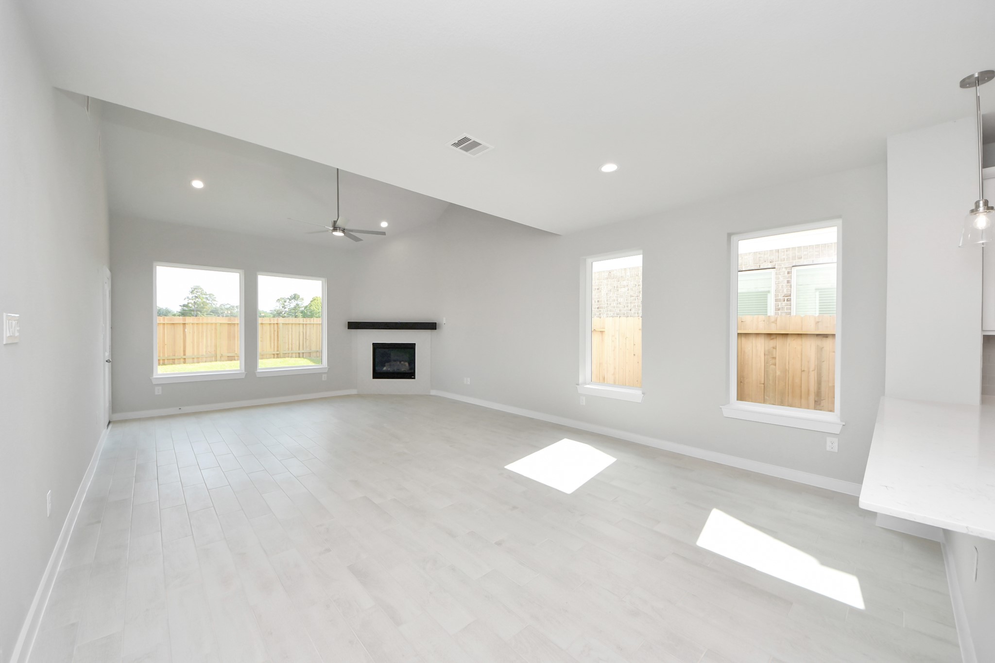 2946 Burris Park Drive Spring, TX 77373 - Photo 14 of 37 a view of an empty room with a window and a fireplace