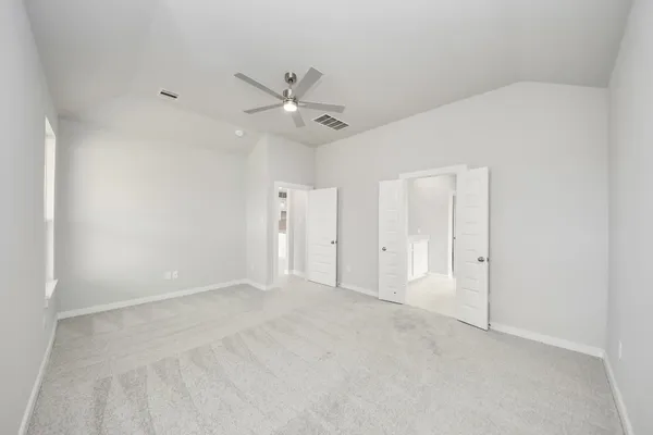 a bathroom with double sink and a mirror