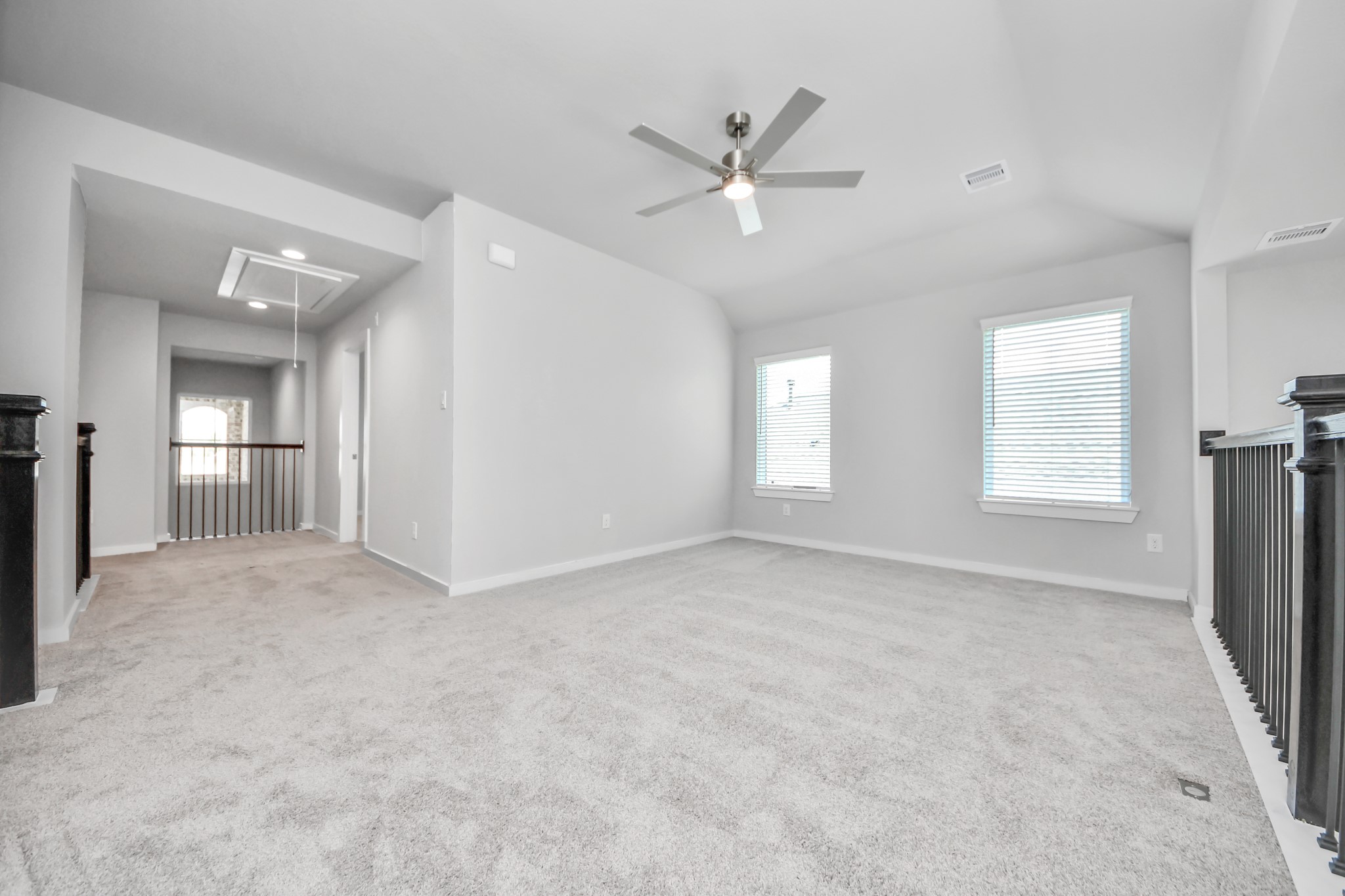 2946 Burris Park Drive Spring, TX 77373 - Photo 30 of 45 Ascend to relaxation in this fantastic game room! Ideal for both casual gatherings and adult gaming, it boasts plush carpet, lofty ceilings, custom paint, and ample windows for abundant natural light.