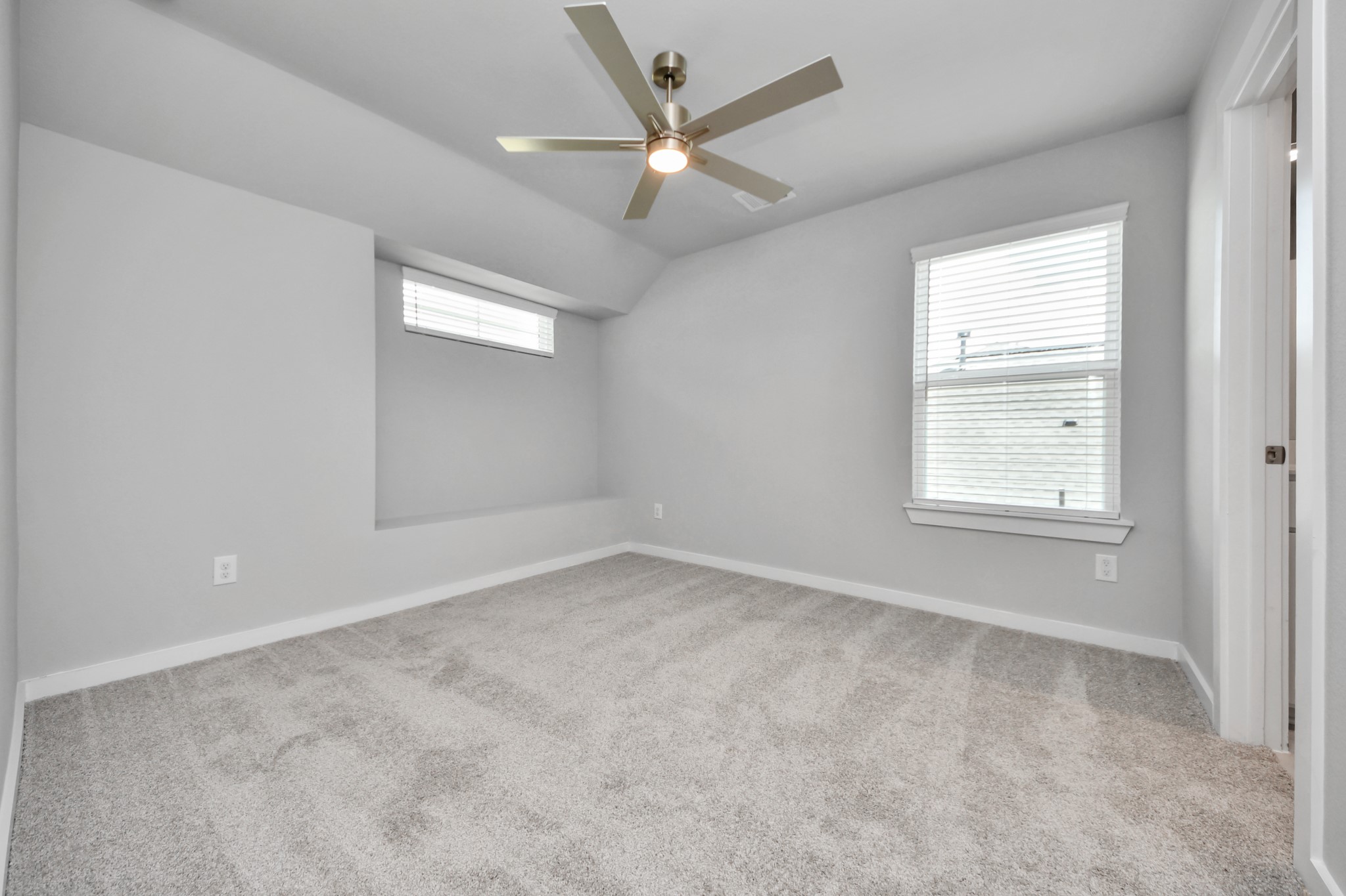 2946 Burris Park Drive Spring, TX 77373 - Photo 34 of 45 an empty room with a window and a fan