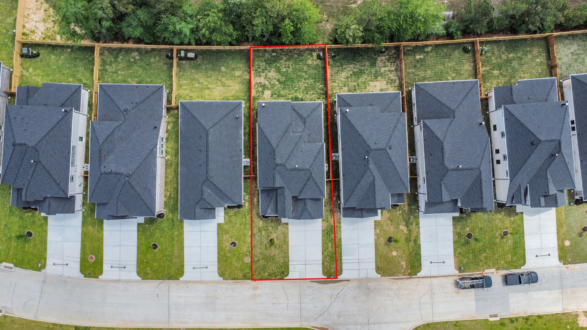 2946 Burris Park Drive Spring, TX 77373 - Photo 6 of 45 An aerial view of a spacious subdivision lot, highlighting a well-maintained yard and a fully fenced perimeter, offering both privacy and expansive outdoor space.