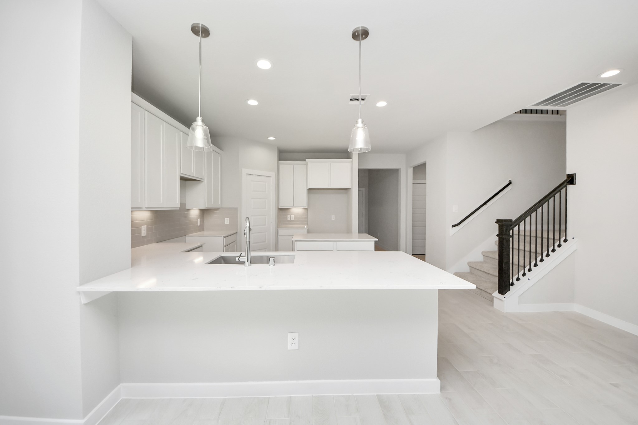 2946 Burris Park Drive Spring, TX 77373 - Photo 9 of 37 a view of kitchen with kitchen island stainless steel appliances sink and stove