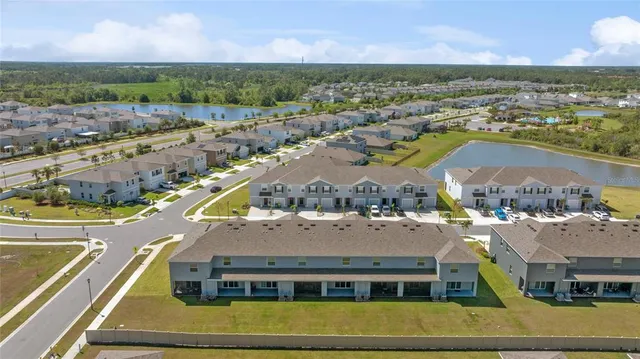 a view of a city with a building in the background