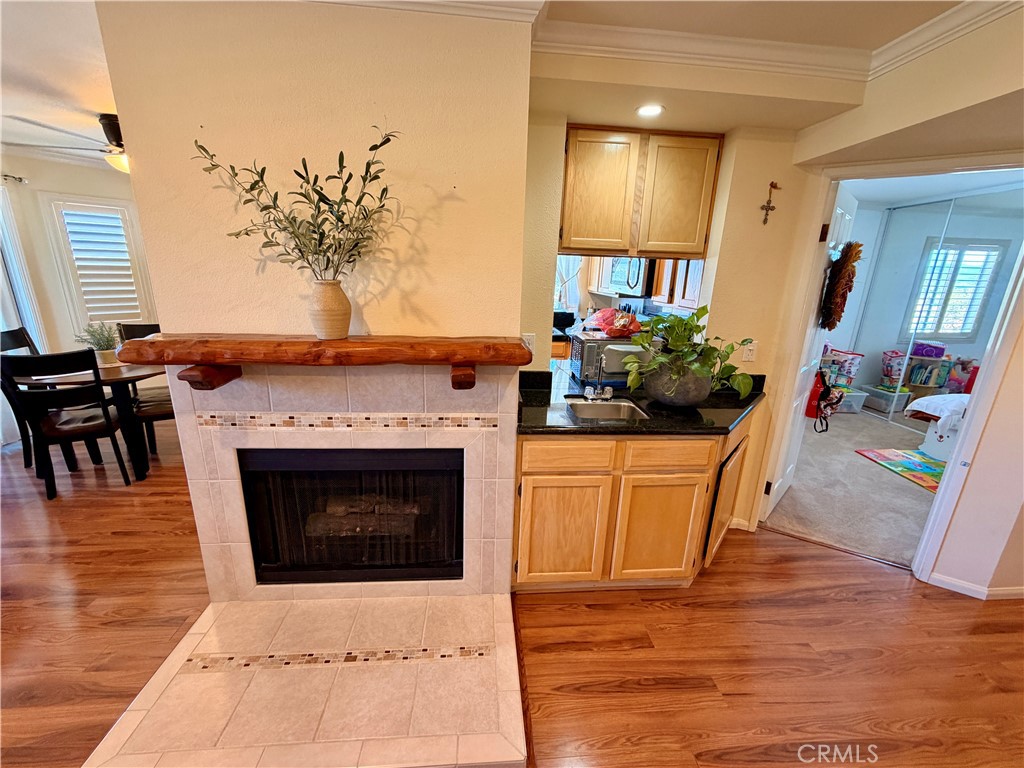 19804 Sandpiper Place, Unit 9 Newhall, CA 91321 - Photo 4 of 27 a living room with furniture and a fireplace
