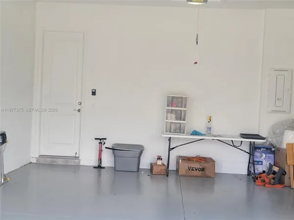 a bedroom with furniture and a bed