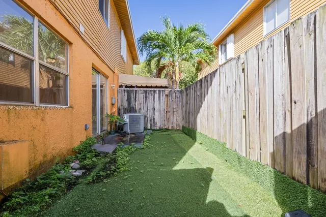 a backyard of a house with garden