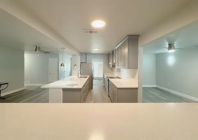 a upper view of a living room and kitchen