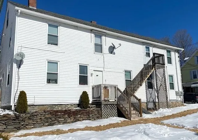 a view of a back yard of the house