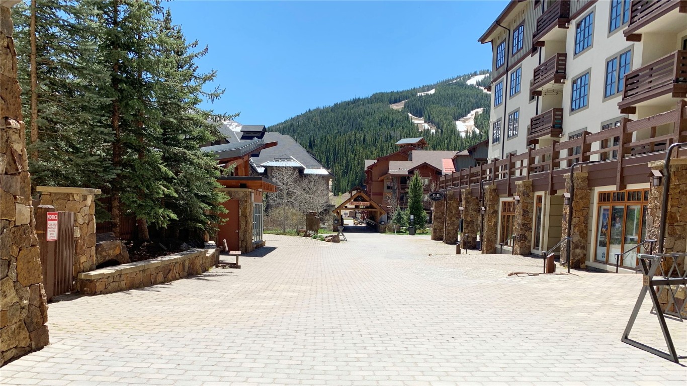 910 Copper Road, Unit 122 Copper Mountain, CO 80443 - Photo 2 of 25 a view of a road with a building in the background