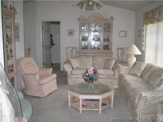 1764 Southwest Gregor Way Stuart, FL 34997 - Photo 3 of 12 Living Room.