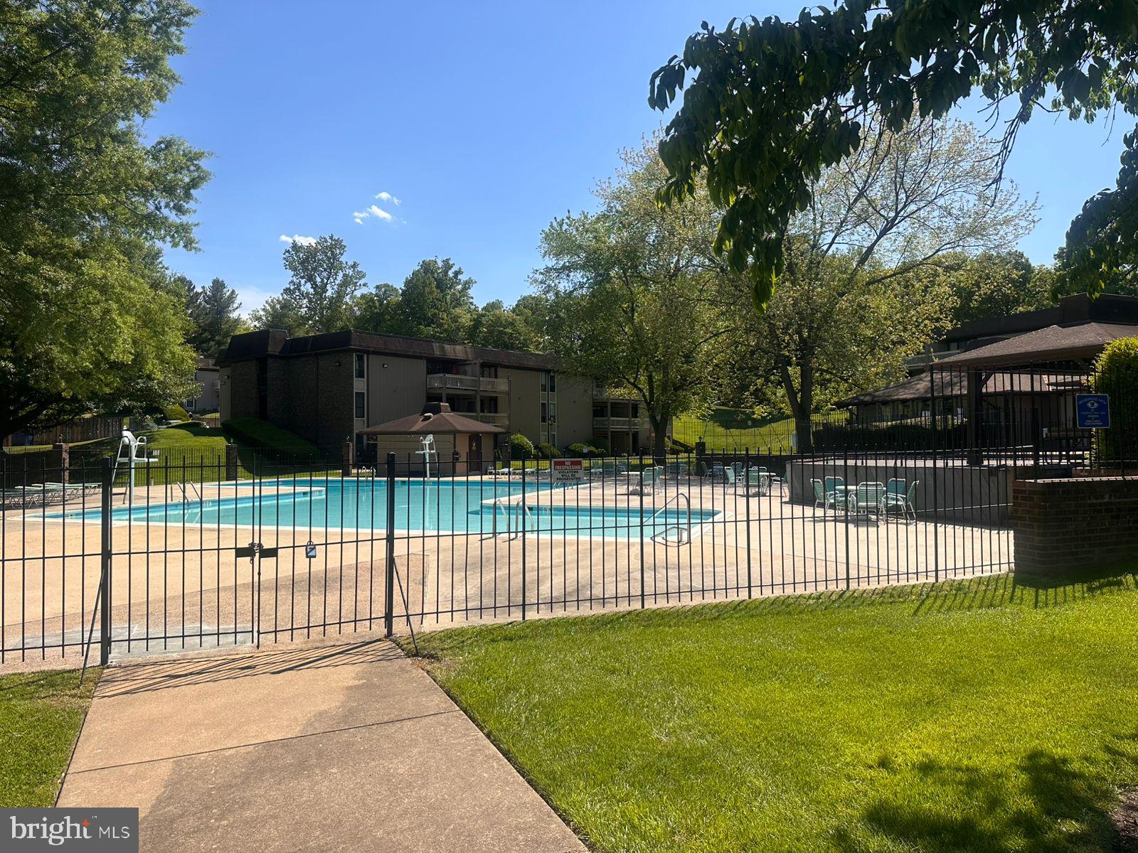 5821 E Royal Ridge Drive, Unit E Springfield, VA 22152 - Photo 18 of 20 a view of a fence