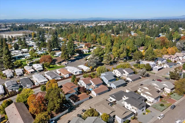 an aerial view of residential building with parking space